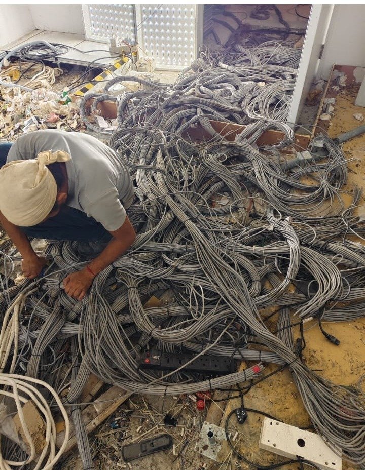 Our Team Sorting Wire Scrap